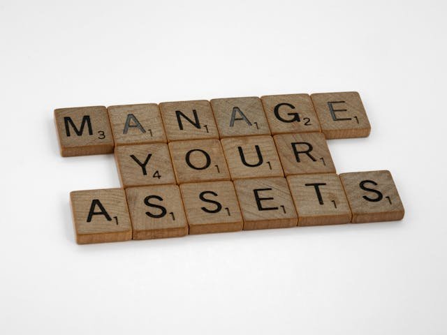 Lawrence Olivier reviewing an asset protection plan with clients